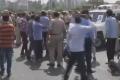 Cop Clings To Bonnet As Speeding Car Drags Him A Kilometre - Sakshi Post