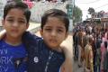 Photo of twin siblings Inset:Protests in Chitrakoot town of Satna, MP - Sakshi Post