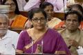 Finance Minister Nirmala Sitharaman on Friday proposed to issue Aadhaar cards to non-resident Indians holding Indian passport on their arrival in the country - Sakshi Post