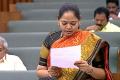 Andhra Pradesh Home Minister Sucharitha reading the resolution in the assembly - Sakshi Post