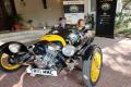 Alan Braithwaite and his wife Pat on their Morgan three-wheeler - Sakshi Post