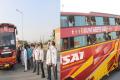 1st Batch of AP Fishermen board 10 buses from Gujarat - Sakshi Post