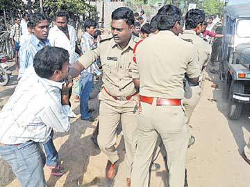 Police Beat Farmers Who Want to Protect Their Lands - Sakshi Post