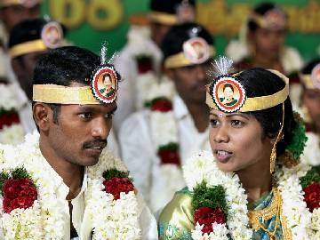 ‘Amma’ placed on the head of newly-wed couples - Sakshi Post