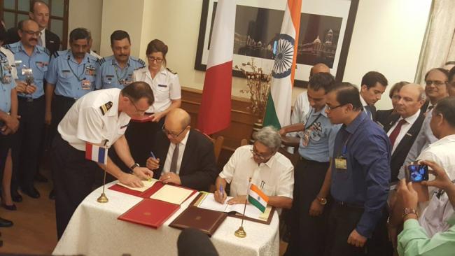 The Inter Governmental Agreement was signed by Defence Minister Manohar Parrikar and his visiting French counterpart Jean Yves Le Drian. - Sakshi Post