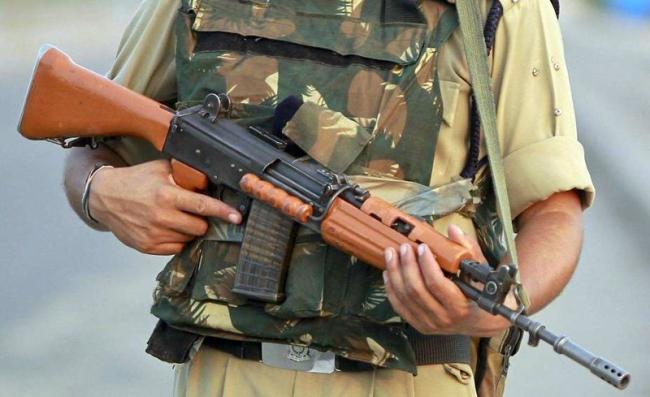 A paramilitary soldier with the INSAS rifle - Sakshi Post