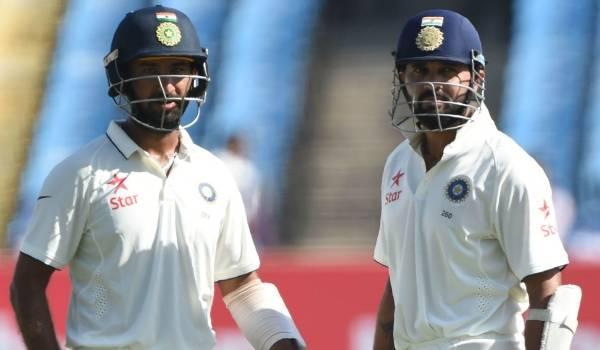 Cheteshwar Pujara and Murali Vijay - Sakshi Post