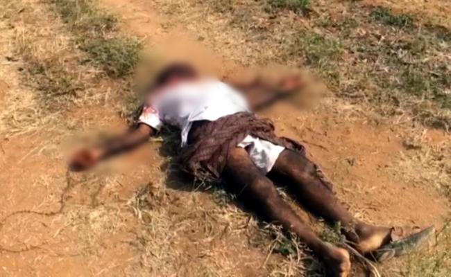 Chenna Reddy’s body lying in the fields in Badanapalli village - Sakshi Post