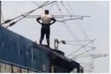 Man on the roof a train - Sakshi Post