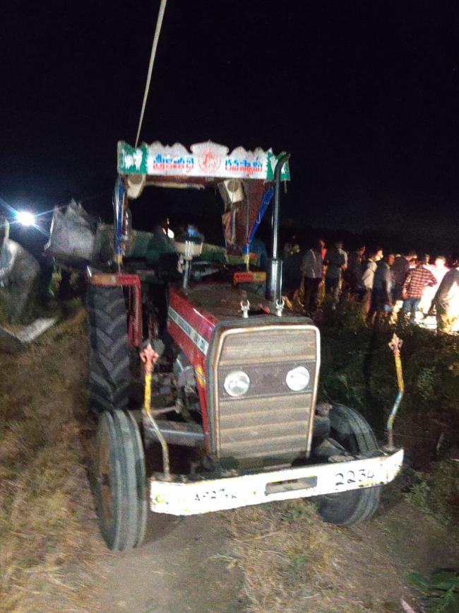 The tractor which had hit a electric pole - Sakshi Post