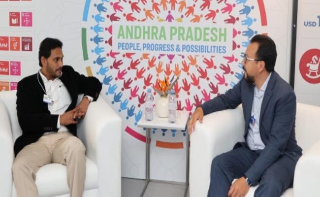 Chief Minister YS Jagan Mohan Reddy interacting with the WEF Sustainable Mobility chief at Davos -Sakshi Post
